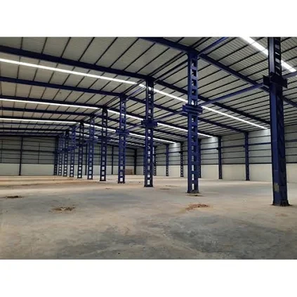 Empty warehouse interior with a steel frame structure